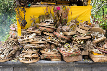 Traditional balinese offerings to Gods burned Indonesia Bali temple