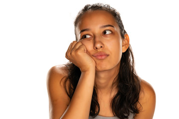 portrait of bored young arabic woman on white background