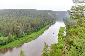 Fototapeta na wymiar Big cliffs (rocks) on the Ay river. Chelyabinsk region, South Ural, Russia
