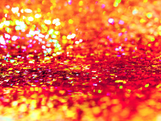 Bright red background. Shiny and sparkling holographic backdrop.