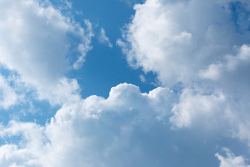 white clouds in the blue sky during
