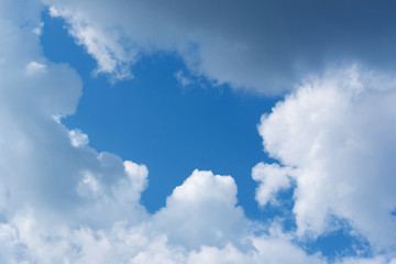 white clouds in the blue sky during