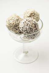 Various of round raw organic sweets with cacao chocolate and sesame. Homemade cooking