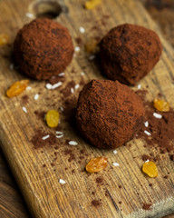 Various of round raw organic sweets with cacao chocolate and sesame. Homemade cooking