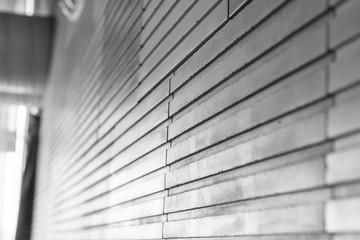 A background with relieved gray wall tile