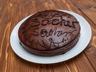 Homemade vegan organic cake. Almond flour and cacao chocolate