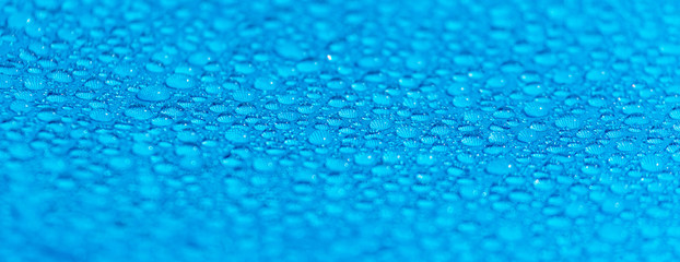 Raindrops on a tent as an abstract background