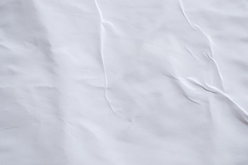 Blank white crumpled and creased paper poster texture background
