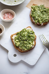Healthy avocado toasts. Vegetarian breakfast concept