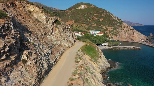 Aerial video of mountain ground road to cretan village Almirida and Mediterannean sea. Crete, Greece