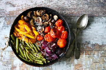 Set of vegetables baked in a pan. Healthy diet. Vegan food.