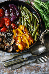 Set of vegetables baked in a pan. Healthy diet. Vegan food.