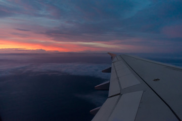 Fototapeta na wymiar Dawn seen from a plane in the Azores Islands