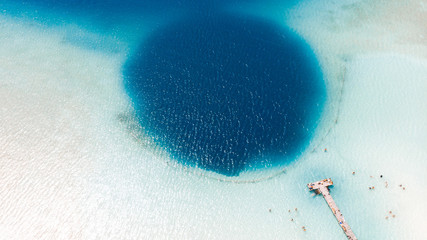 Beautiful blue hole Kaan Luum lagoon in Tulum, Quintana Roo in Mexico.