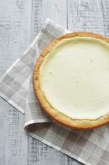 homemade cottage cheese pie on linen towel