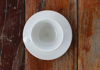 Fototapeta na wymiar Empty coffee cup placed on wood