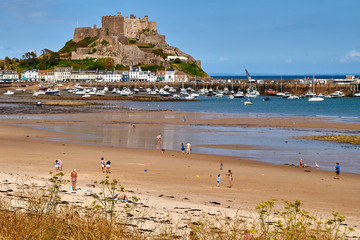 Grouville Bay and Mont Orgeuil castle in Jersey in the Channel Isles
