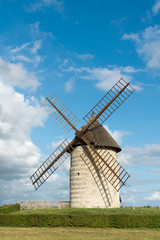 Fototapeta na wymiar vertical view of the historic windmill Moulin de Pierre in Hauville in Normandy