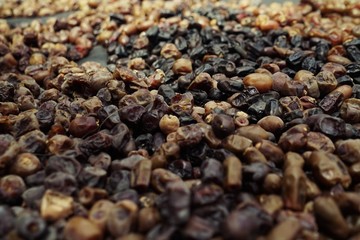 Dried date fruit rotates, background dates, close up. Food background. Organic food. Sunlights on many dates types . summer fruit 