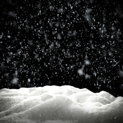 Winter snow flakes with free space for your product. Black background to mount your picture through the screen