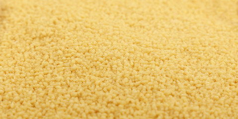 Couscous grain close up background