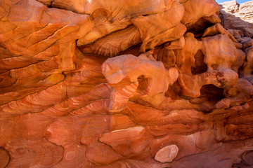 Background based on red sandstone texture. Photos of the walls of the canyon in the Sinai desert