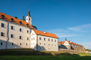 Obraz premium Church and monastery in Wigry on a sunny day, Podlaskie, Poland