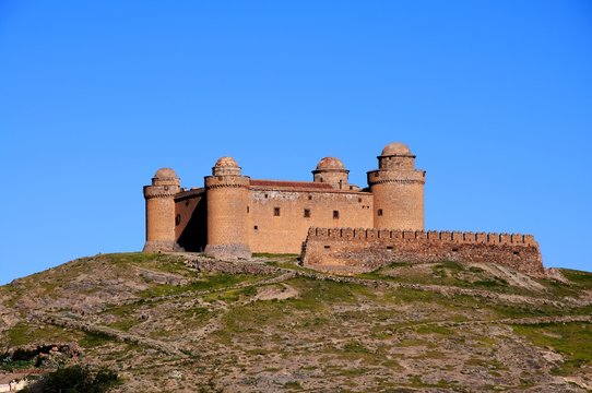 View of the castle on the hilltop, La Calahorra, Spain.