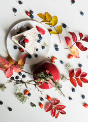 Autumn leaves top view still life with cake
