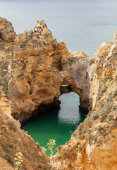 Algarve beach coast and rocks on the ocean in Portugal