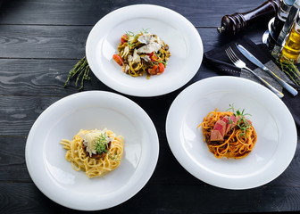 set of three italian pasta on the table