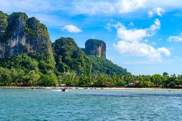 Fototapeta na wymiar Railay West Beach with beautiful rock formation and landscape scenery in Krabi province - tropical coast with paradise beaches - Thailand