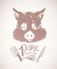 Pig's head, graphic silhouette image, with additional design elements the inscription, of the pig's knuckle and knives. 