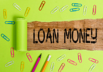 Conceptual hand writing showing Loan Money. Concept meaning Something lent or furnished on...