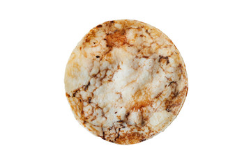 Brown rice chips isolated on white background. Healthy crispy snack