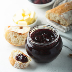 Homemade blackberry jam served with fresh baguette