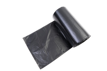 Roll of black trash bag on white background