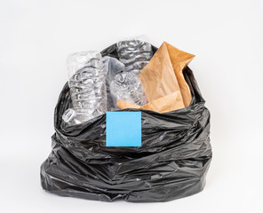 Trash bag with recycle garbage on white background