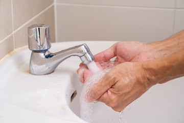 Hand washing with soap foam