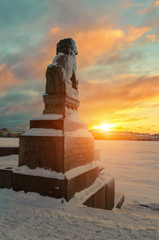 Chinese lion Chi Tza on Petrovskaya embankment in the beams of winter dawn.