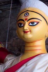 Clay idol of Goddess Devi Durga is in preparation for the upcoming Durga Puja festival at a pottery...