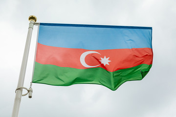 flag of Azerbaidjan waving in the wind ablazed