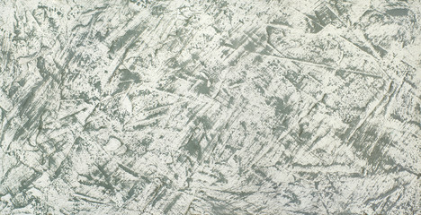 Concrete texture background with scratches. Panorama in the form of a gray textural abstract...