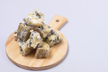 Delicious Italian Cheese Gorgonzola a on Wooden Cutting Board Close Up Horizontal Copy Space