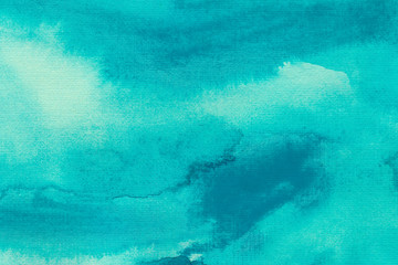 Turquoise splash watercolor texture background. Hand drawn vivid gradient backdrop.