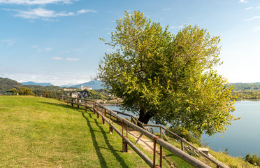 View of Borromeo Castle at Angera from the public park of Rocca Borromeo of Arona, Italy