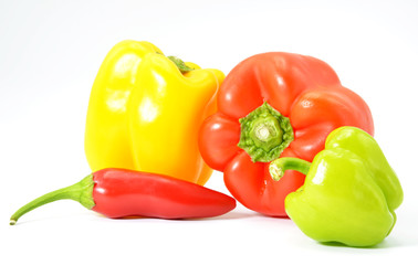 organic and fresh peppers isolated on white background