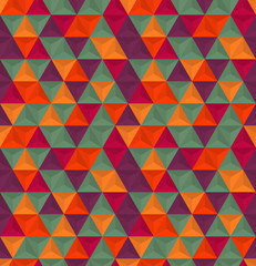 Vector abstract seamless pattern with triangles of different colors. Textile background for package, cover, greeting cards.