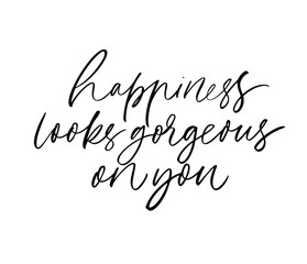 Happiness looks gorgeous on you ink brush vector calligraphy. Romantic phrase handwritten brush lettering.