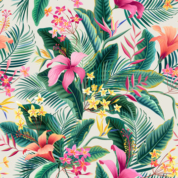 seamless tropical floral pattern with hibiscus and palm leaves